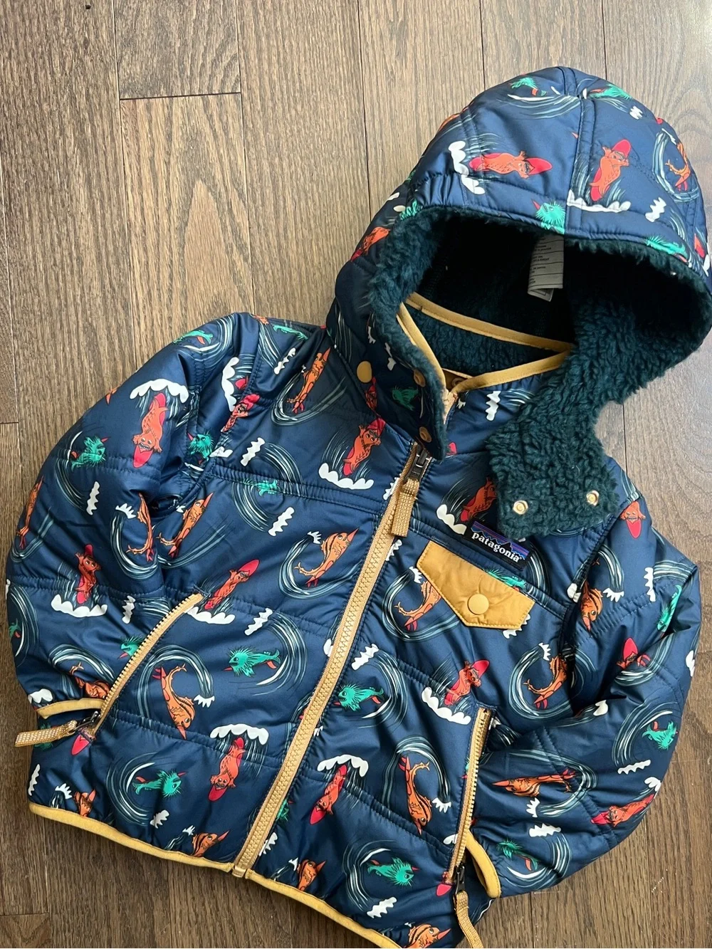 Patagonia Navy Surf Print Reversible Tribbles Jacket with hood size 2T